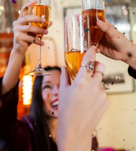 Guests raising glasses at New Year’s Eve Party at The Preserve Sporting Club & Resort