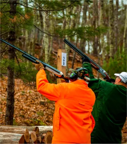 Hunters aiming during The Preserve November Driven Hunt.